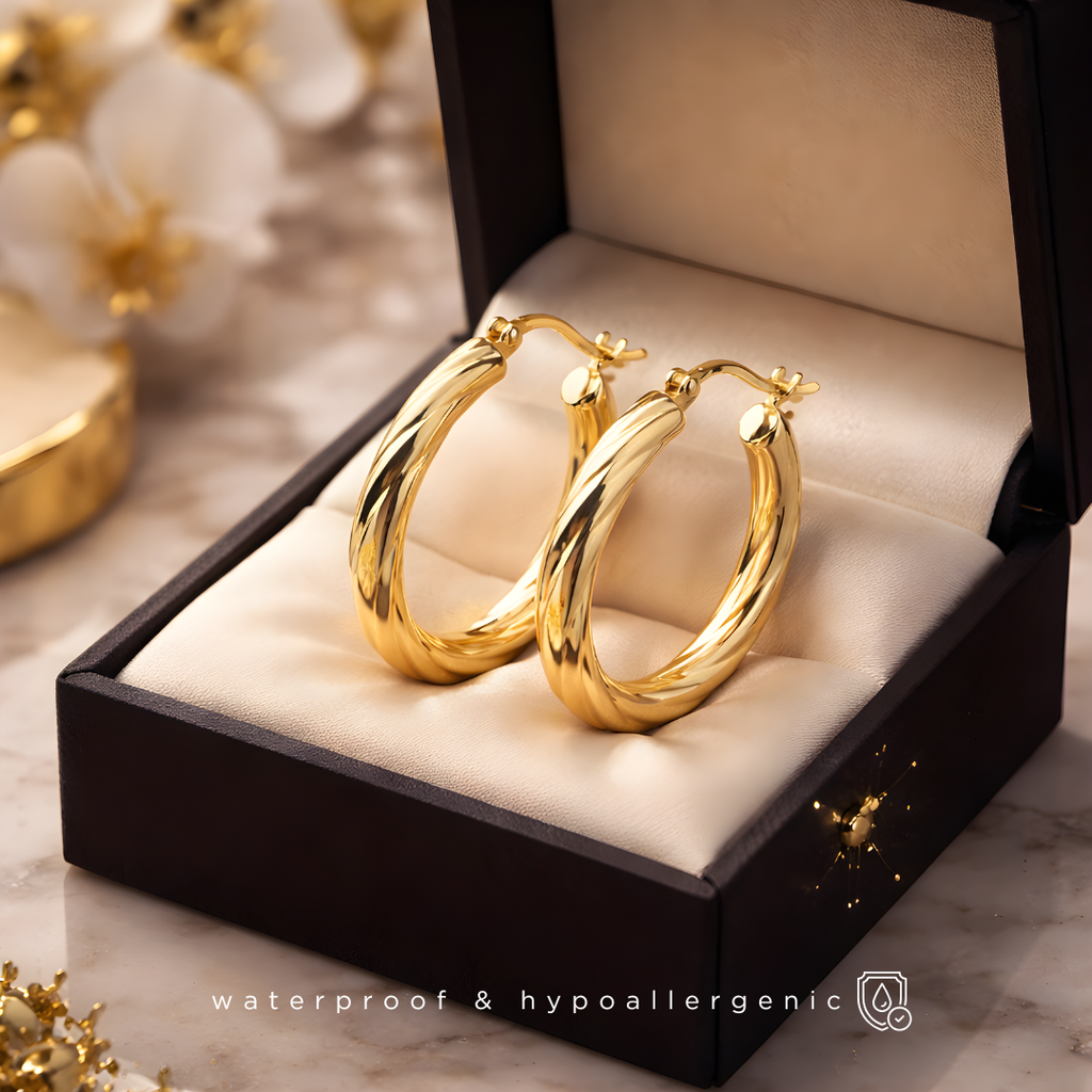 GIRÊ - Gedrehte Creolen – 18K vergoldet